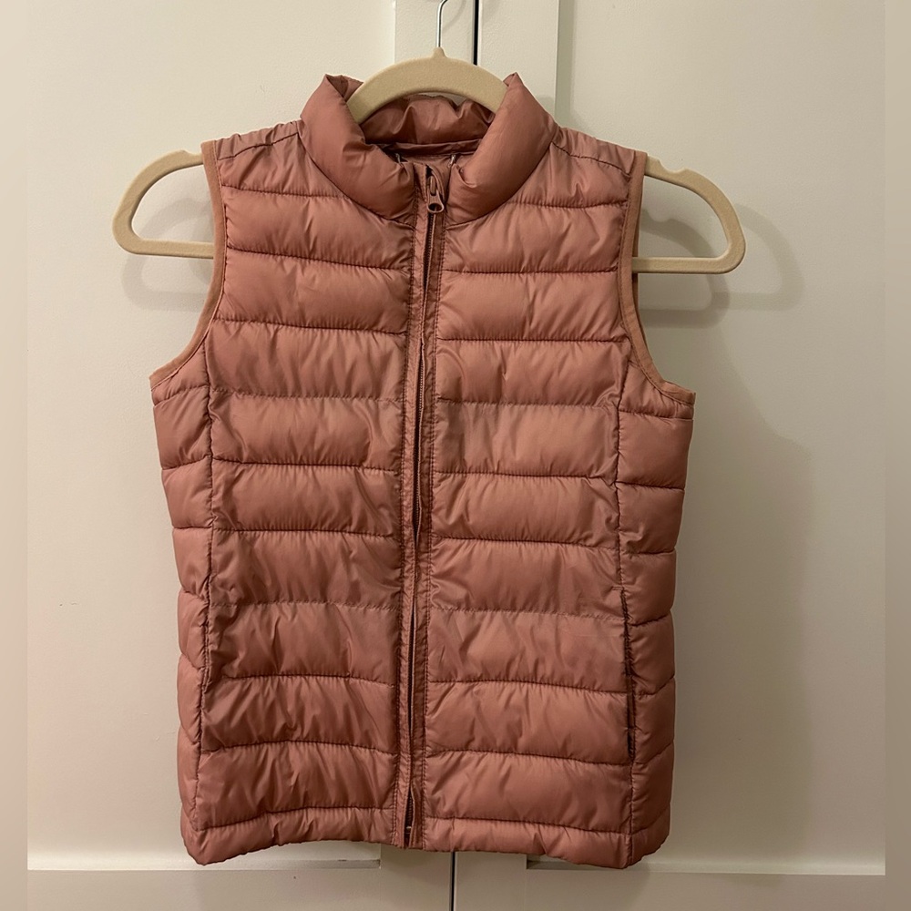 GAP Kids rose colored puffer vest - size YM - excellent used condition.